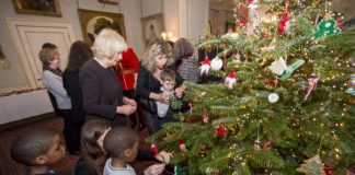 The Queen Invites Children to Decorate Christmas Tree The Duchess of Cornwall decorates the Clarence House Christmas tree with the help of children supported by Helen & Douglas House and The London Taxi Drivers' Fund for Underprivileged Children, 2015.