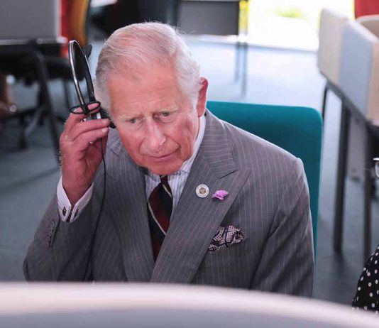 The Prince of Wales Opens Moneypenny’s Headquarters HRH The Prince of Wales listening in to a call with Ashleigh Tatton, Team Leader at Moneypenny