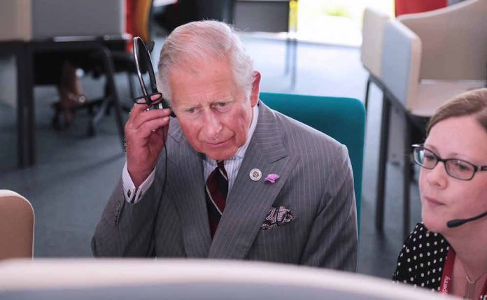 HRH The Prince of Wales listening in to a call with Ashleigh Tatton, Team Leader at Moneypenny
