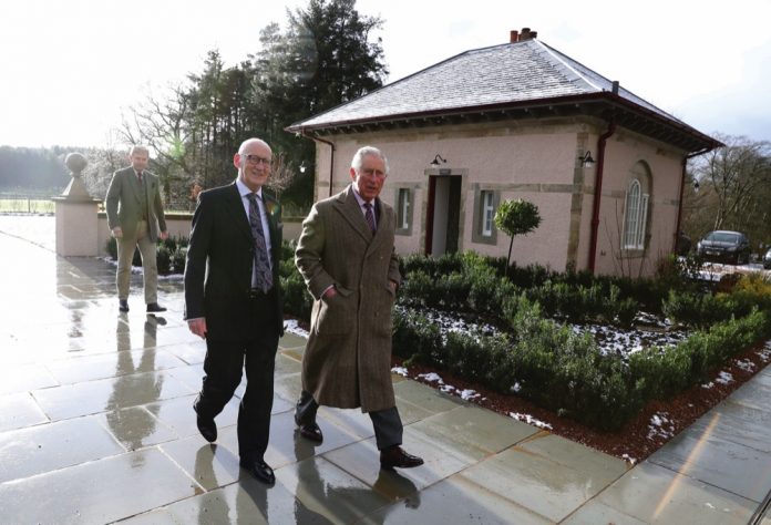 Prince Charles with Kenneth Dunsmuir Executive Director at the Prince's Foundation as he arrives at The Dumfries House Health and Wellbeing Centre in Cumnock, 2019.