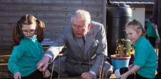 The King will Receive the Privileged Bodies at Buckingham Palace The Prince of Wales talks to pupil Imogen (right) and Avalyn during a visit to Bletchingdon Parochial Church of England School on the Bletchingdon Estate Development in Oxfordshire, 2019