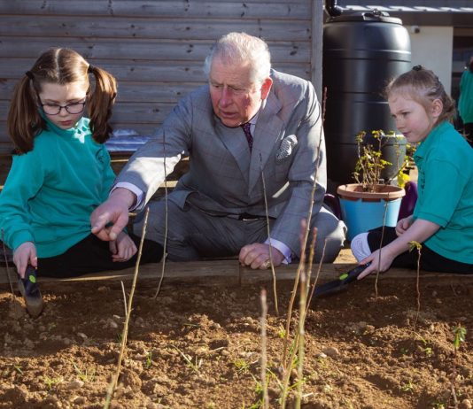 The King will Receive the Privileged Bodies at Buckingham Palace The Prince of Wales talks to pupil Imogen (right) and Avalyn during a visit to Bletchingdon Parochial Church of England School on the Bletchingdon Estate Development in Oxfordshire, 2019