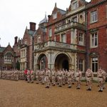 The Prince of Wales observes a royal Salute from the 2nd Battalion, The Mercian Regiment before presenting campaign medals for service in Afghanistan outside Sandringham House on the Royal Estate in Norfolk, 2019.