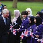 The Prince of Wales is greeted by local school children during a visit to the British Muslim Heritage Centre in Manchester, where he met members of the Muslim community and learned about the centre’s programme of education and community initiatives, 2019.