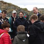 The Duke and Duchess of Cambridge explore the wildlife habitat on Newborough Beach in North Wales with members of Menai Bridge Scouts, 2019