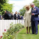The Prince of Wales and Duchess of Cornwall looking at graves during the Royal British Legion’s Service of Remembrance, at the Commonwealth War Graves Commission Cemetery, in Bayeux, France, as part of commemorations for the 75th anniversary of the D-Day landings.