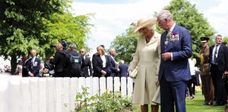 His Majesty The King Become Patron of the Commonwealth War Graves Commission The Prince of Wales and Duchess of Cornwall looking at graves during the Royal British Legion's Service of Remembrance, at the Commonwealth War Graves Commission Cemetery, in Bayeux, France, as part of commemorations for the 75th anniversary of the D-Day landings.