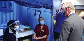 His Majesty The King to Host Reception Celebrating Nurses and Midwives The Prince of Wales meets with front line health and care workers administering and receiving the Covid-19 vaccine during a visit to the Gloucestershire Vaccination Centre at Gloucestershire Royal Hospital.