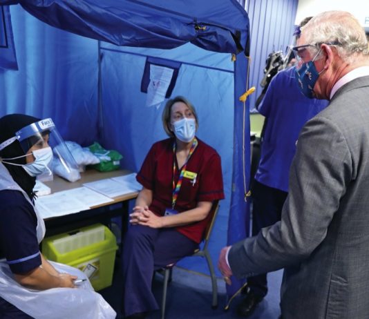 His Majesty The King to Host Reception Celebrating Nurses and Midwives The Prince of Wales meets with front line health and care workers administering and receiving the Covid-19 vaccine during a visit to the Gloucestershire Vaccination Centre at Gloucestershire Royal Hospital.