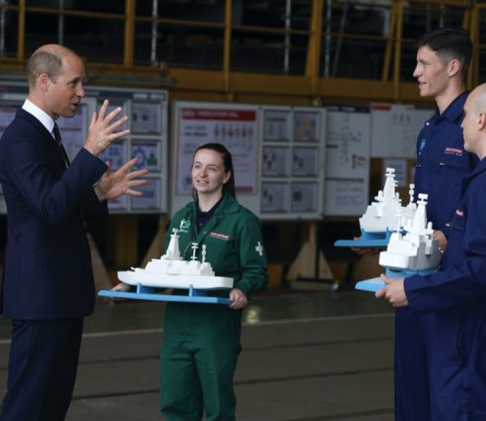 The Prince of Wales to Attend the Lord High Admiral’s Divisions Models of a Royal Navy warships are given as gifts to The Duke of Cambridge, known as the Earl of Strathearn in Scotland after the steel cutting ceremony for HMS Belfast during a visit to the BAE Systems shipyard in Glasgow, as part of a trip to Scotland for Holyrood Week, June, 2021.