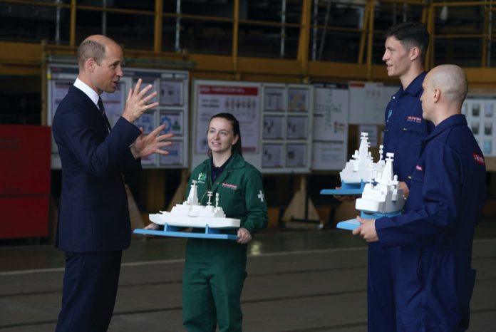 Models of a Royal Navy warships are given as gifts to The Duke of Cambridge, known as the Earl of Strathearn in Scotland after the steel cutting ceremony for HMS Belfast during a visit to the BAE Systems shipyard in Glasgow, as part of a trip to Scotland for Holyrood Week, June, 2021.