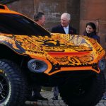 The Prince of Wales (second left) is shown McLaren’s Extreme E car and its new hand-drawn livery, by Zak Brown, Chief Executive of McLaren Racing (left), at the Kelvingrove Art Gallery and Museum, during the Cop26 summit being held at the Scottish Event C