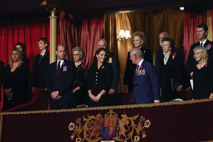 Members of the Royal family, including, the Prince of Wales, the Duchess of Cornwall, the Duke and Duchess of Cambridge, the Earl and Countess of Wessex, the Princess Royal and Vice Admiral Sir Tim Laurence, the Duke and Duchess of Gloucester, the Duke of Kent and Princess Alexandra, stand in the Royal box during the annual Royal British Legion Festival of Remembrance at the Royal Albert Hall in London. November 13, 2021.