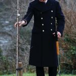 The Prince of Wales plants a tree after presiding over the Lord High Admiral’s Divisions at Britannia Royal Naval College, Dartmouth. Picture date: Thursday December 16, 2021.