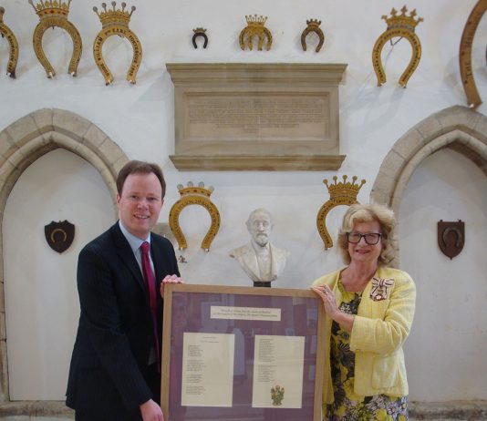 ‘Our Gracious, Noble Queen’ Henry Dawe presenting a framed copy of his Jubilee Poem to the Lord-Lieutenant, Dr Sarah Furness, at Oakham Castle. The small box attached to the bottom of the frame contains a USB stick which will enable a member of staff to show the video of the poem to The Queen on a computer or television set.
