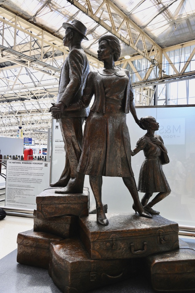 A statue designed by Jamaican artist and sculptor Basil Watson, unveiled by The Duke and Duchess of Cambridge in Waterloo Station, to mark the Windrush generation, 2022.