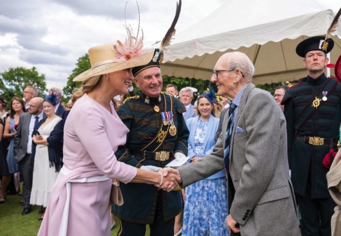 Sophie Wessex, known as the Countess of Forfar while in Scotland, meets 100-year-old David Flucker during a garden party at the Palace of Holyroodhouse in Edinburgh, June, 2022.