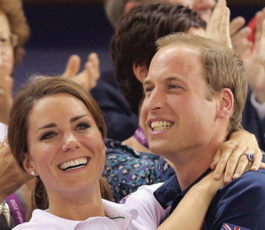 The Duke and Duchess of Cambridge Attend Commonwealth Games Prince William and Catherine share a joyful embrace watching Team GB compete in the cycling 2012