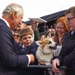 King Charles III meets a woman holding a corgi as he arrives for a visit to Hillsborough Castle, Co Down. Picture date: Tuesday September 13, 2022.