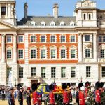 London, UK. 14th Sep, 2022. The Coffin of Queen Elizabeth II of the United Kingdom is transported from Buckingham Palace via the Horse Guards to Westminster Hall in London, on September 14, 2022, on a gun carriage A ceremony will be held in Westminster Ha