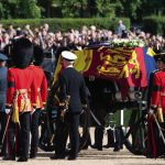 London, UK. 14th September, 2022. Thousands of mourners packed into the Mall, Horseguards Parade and along the route to Westminster Hall today where the late Queen Elizabeth II was taken by a horse drawn gun carriage where she is to lay in State until her