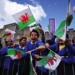 School children wait for King Charles III to arrive at Cardiff Castle in Wales. Picture date: Friday September 16, 2022.