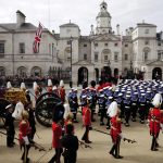 The State Gun Carriage carries the coffin of Queen Elizabeth II, draped in the Royal Standard with the Imperial State Crown and the Sovereign’s orb and sceptre, in the Ceremonial Procession following her State Funeral at Westminster Abbey, London. Picture