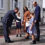 Prince George, Princess Charlotte and Prince Louis, accompanied by their parents the Duke and Duchess of Cambridge, are greeted by Headmaster Jonathan Perry as they arrive for a settling in afternoon at Lambrook School, near Ascot in Berkshire. The settli