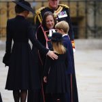 the Princess of Wales (left), Prince George (right) and Princess Charlotte arriving at the State Funeral of Queen Elizabeth II, held at Westminster Abbey, London. Picture date: Monday September 19, 2022.