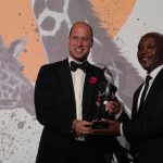 The Prince of Wales awards Achilles Brunnel Byaruhanga of Uganda with the Prince William Award for Conservation in Africa during the 10th annual Tusk Conservation Awards at Hampton Court Palace, London. Picture date: Tuesday November 1, 2022.