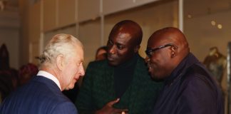 His Majesty The King Will Visit The Africa Centre King Charles III speaks to fashion designer Ozwald Boateng, OBE (left) and Edward Kobina Enninful OBE, editor-in-chief of British Vogue (right) during his visit to the Africa Fashion exhibition at the Victoria and Albert Museum, London. November 3, 2022.