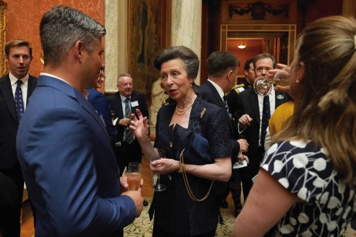 The Princess Royal speaks to guests as she hosts a reception for recipients of The Queen's Awards for Enterprise at Buckingham Palace in London, July 12, 2022.