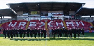 The Prince of Wales Visits Wrexham on St. David’s Day King Charles III and the Queen Consort (centre) during their visit to Wrexham Association Football Club's Racecourse Ground, meeting owners and Hollywood actors, Ryan Reynolds (centre left) and Rob McElhenney (centre right), and players to learn about the redevelopment of the club, as part of their visit to Wrexham. December 9, 2022.