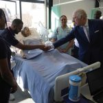 Britain’s King Charles III speaks to students and trainees at the Intensive Care Ward as he visits the University of East London to mark the University’s 125th anniversary and open a new frontline medical teaching hub in London, Wednesday, Feb. 8, 2023.(A