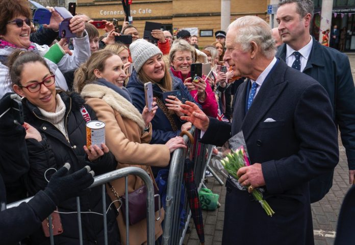 King Charles III speaks to members of the public as he arrives for a reception with members of the local community and organisations at the Church of Christ the Cornerstone, as he visits Milton Keynes, Buckinghamshire, to celebrate its new status as a city, awarded as part of the late Queen Elizabeth II's Platinum Jubilee celebrations. February 16, 2023.