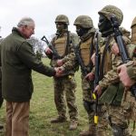 King Charles III meets with Ukrainian recruits being trained by British and international partner forces in Wilthshire, England, Feb. 20, 2023.