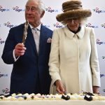King Charles III and the Queen Consort cut a cake during a visit to Colchester Library to meet Age UK volunteers and service users and learn about the library’s impact in the community through the Essex Year of Reading. Picture date: Tuesday March 7, 2023