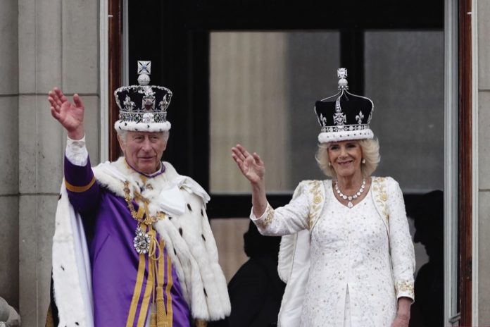 King Charles III and Queen Camilla on the balcony of Buckingham Palace, London, following the Coronation. May 6, 2023.