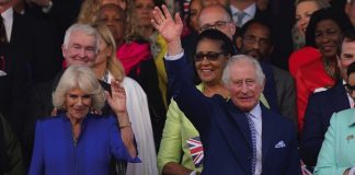 King and Queen Celebrate the Work of William Shakespeare King Charles III and Queen Camilla wave from the Royal Box ahead of the concert at Windsor Castle in Windsor, May 7, 2023