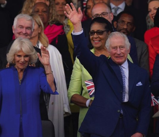 King and Queen Celebrate the Work of William Shakespeare King Charles III and Queen Camilla wave from the Royal Box ahead of the concert at Windsor Castle in Windsor, May 7, 2023