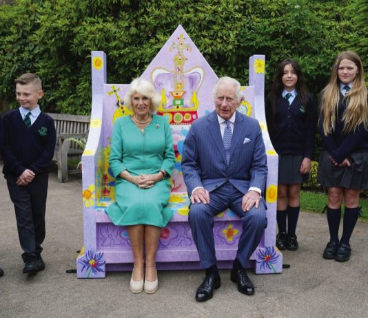 King and Queen Officially Launch Coronation Food Project King Charles III and Queen Camilla meet pupils from Belfast's Blythefield Primary School who have taken part in Historic Royal Palaces' competition to design Coronation benches at Hillsborough Castle, Co Down during a two day visit to Northern Ireland, May 24, 2023.