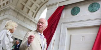 The King Visits Royal School of Engineering King Charles III unveils the plague for the Queen Mother Square and Royal Pavillion as they visit Poundbury at Poundbury in Dorchester, Dorset, June 2023.