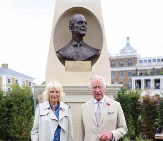 The King and Queen to Visit the Royal Academy of Dramatic Art King Charles III and Queen Camilla at the bronze bust of the late Duke of Edinburgh during a visit to the Duchy of Cornwall's Poundbury development in Dorset, June 27, 2023.