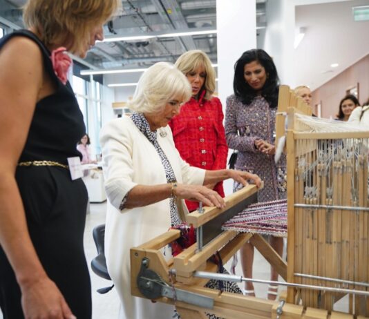 The Queen becomes Honorary Liveryman of the Worshipful Company of Fan Makers The Queen, watched by Brigitte Macron (second right), and Global Chief Executive officer of Chanel, Leena Nair (right), tries her hand at weaving tweed on a traditional loom in the Maison Lesage, during her visit to la Galerie du 19M in Paris, on day two of the State Visit to France. September 21, 2023.