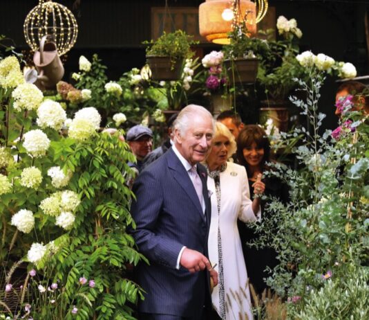 King and Queen to Visit RHS Chelsea Flower Show King Charles III and Queen Camilla visit the Flower Market Thursday, Sept. 21, 2023 in Paris.