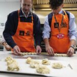 The Duke of Edinburgh (left), in his role as Patron of the Duke of Edinburgh’s Award (DofE) charity, takes part in a cookery class during a visit to Brighton Hove and Sussex Sixth Form College in Brighton, East Sussex, to hear from young people making a d