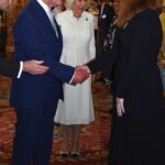 King Charles III and Queen Camilla during a reception to thank those involved in the planning and arrangements following the death of Queen Elizabeth II and the Coronation, at Buckingham Palace, London. Picture date: Thursday October 19, 2023.