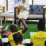 Queen Camilla reads a book in the children’s reading space (Chekechea), during a session with Book Aid International, as she visits the Eastlands Library in Nairobi, on day one of the State Visit to Kenya. October 31, 2023.