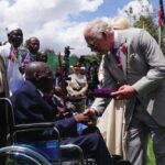 King Charles III meets veteran Samwel Nthigai Mburia, who is believed to be 117 years old, during a visit the Commonwealth War Graves Commission cemetery in Nairobi, joining British and Kenyan military personnel in an act of remembrance, on day two of the
