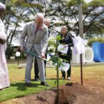 Britain’s King Charles III, centre. plants a tree, with Under-Secretary-General of the United Nations, Zainab Hawa Bangura, at left during a visit to the United Nations Office, in Nairobi, Kenya Wednesday, Nov. 1, 2023. (AP Photo/Brian Inganga, Pool)